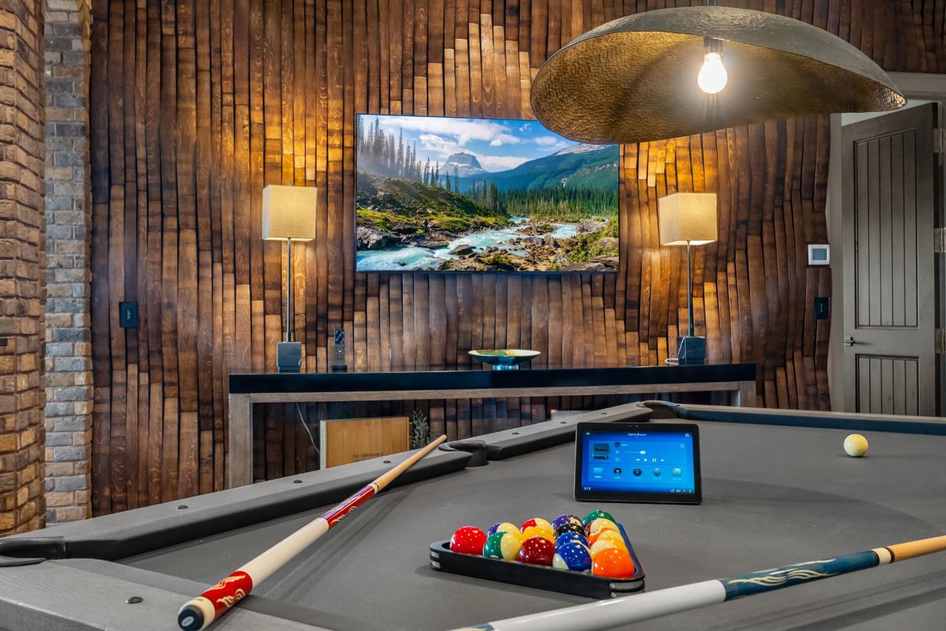 Gray pool table in upscale game room