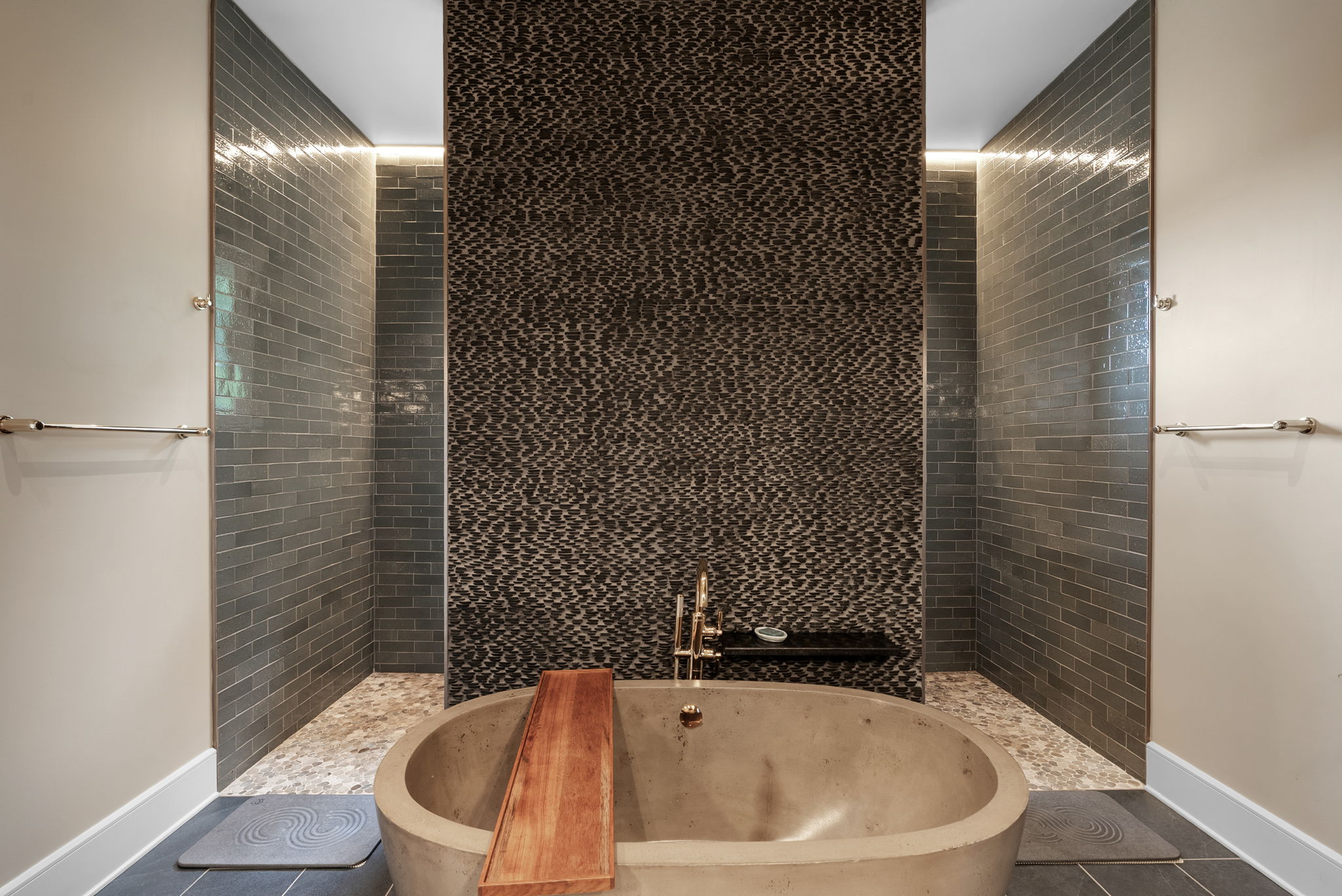 Bathroom with a freestanding tub and accent lighting