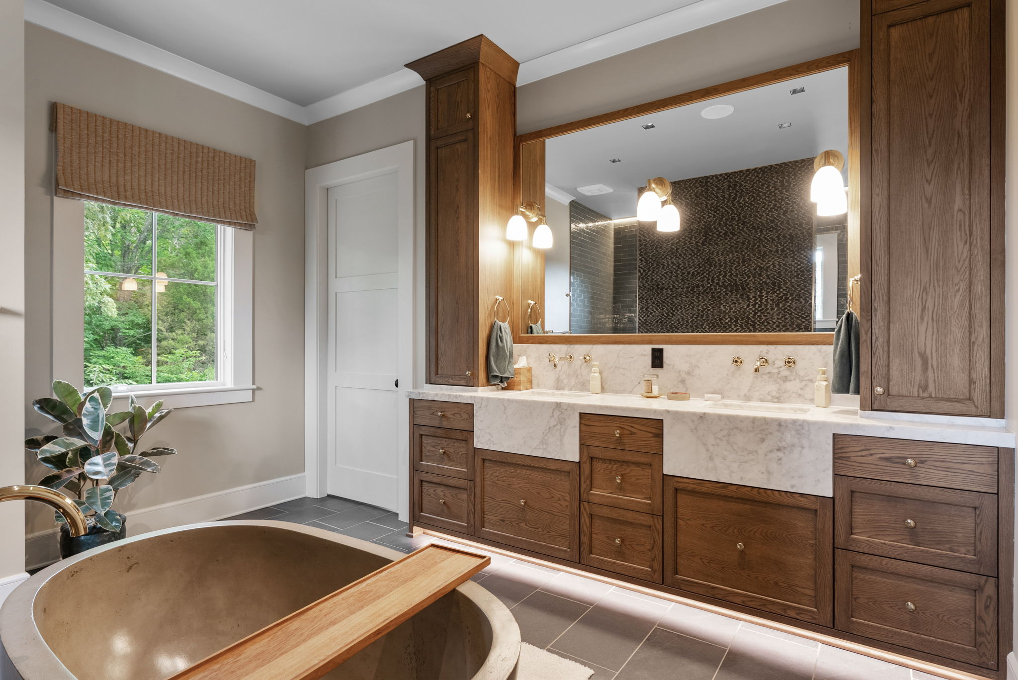 Bathroom vanity with mirrors and integrated lighting