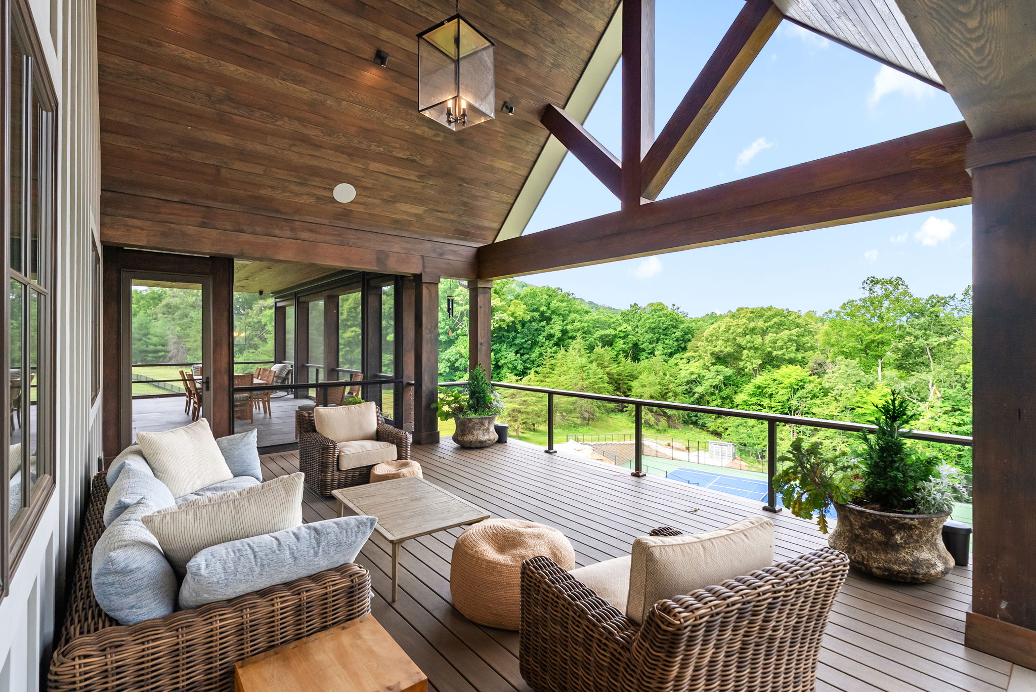 Covered outdoor lounge overlooking the landscape