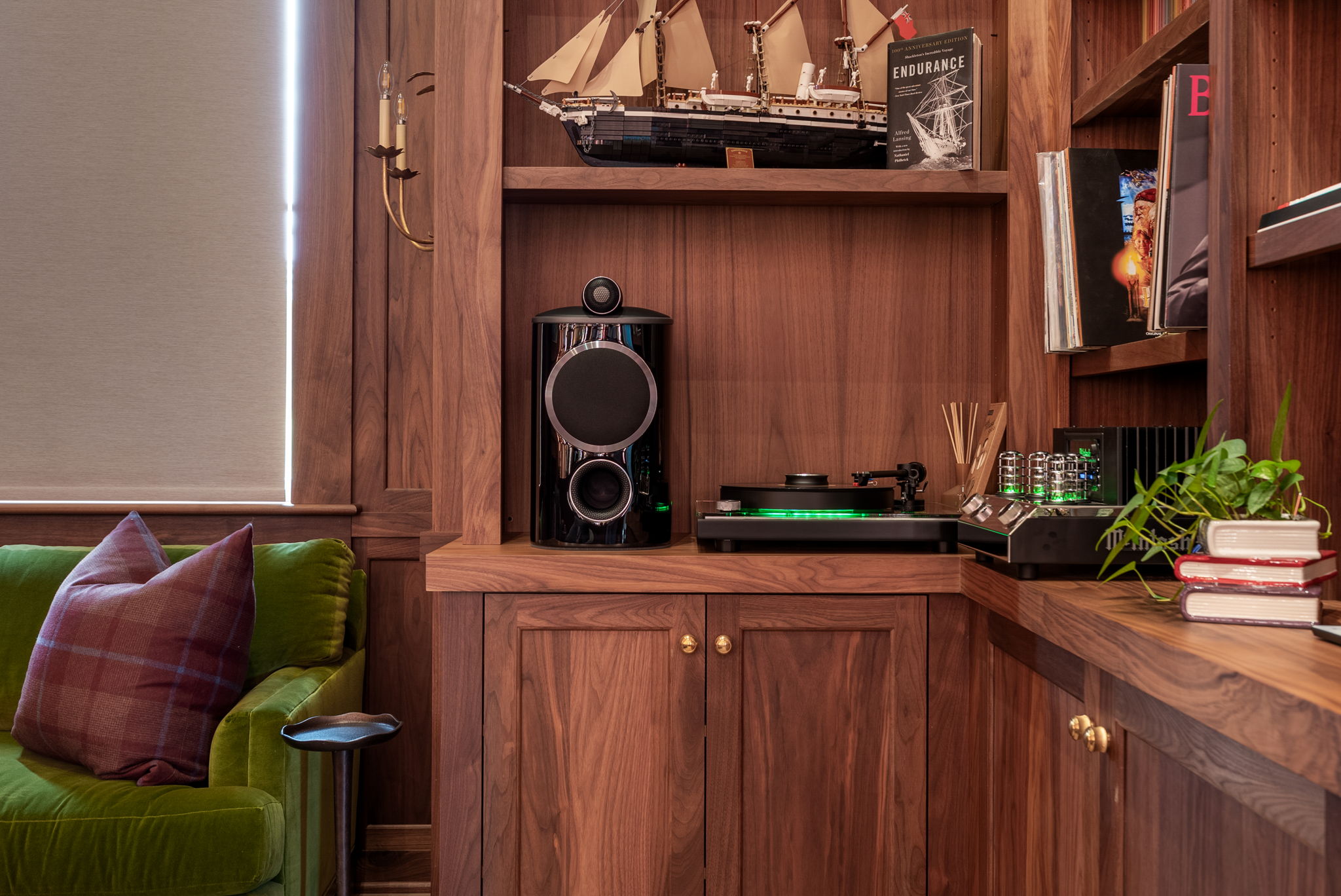 Audio equipment integrated into the library’s built-in shelving
