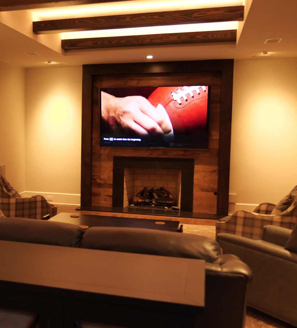 Living space with fireplace and TV